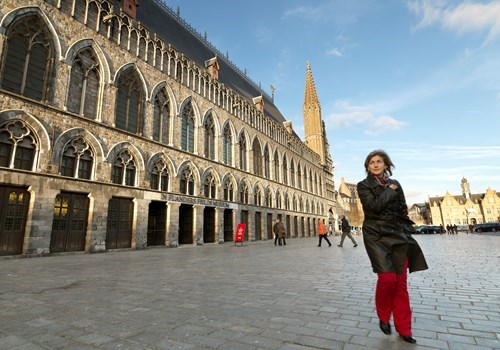 Woman in front of the In Flanders Fields Museum in Ypres, Belgium