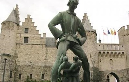 Statue of the giant Lange Wapper at the fortress Het Steen in Antwerp, Belgium