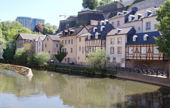 River in Luxembourg with ancient houses on the river bank